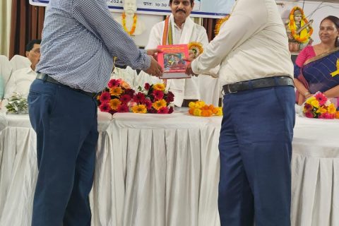 A book being presented to the chief guest during the Teacher Education Department seminar